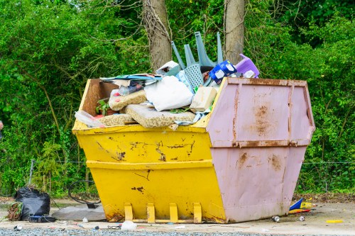 Notting Hill residents arranging furniture for disposal